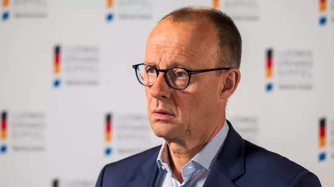 CDU-Chef Friedrich Merz warnt vor dem Einfluss Chinas. - Bild: Peter Kneffel/dpa