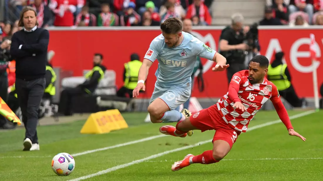 Mainz und Köln lieferten sich ein ruppiges, aber spannendes Spiel im Abstiegskampf. - Bild: Torsten Silz/dpa