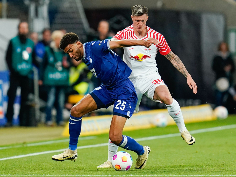 Debüt mit Höhen und Tiefen: Hoffenheims Christian Ilzer   - Foto: Uwe Anspach/dpa