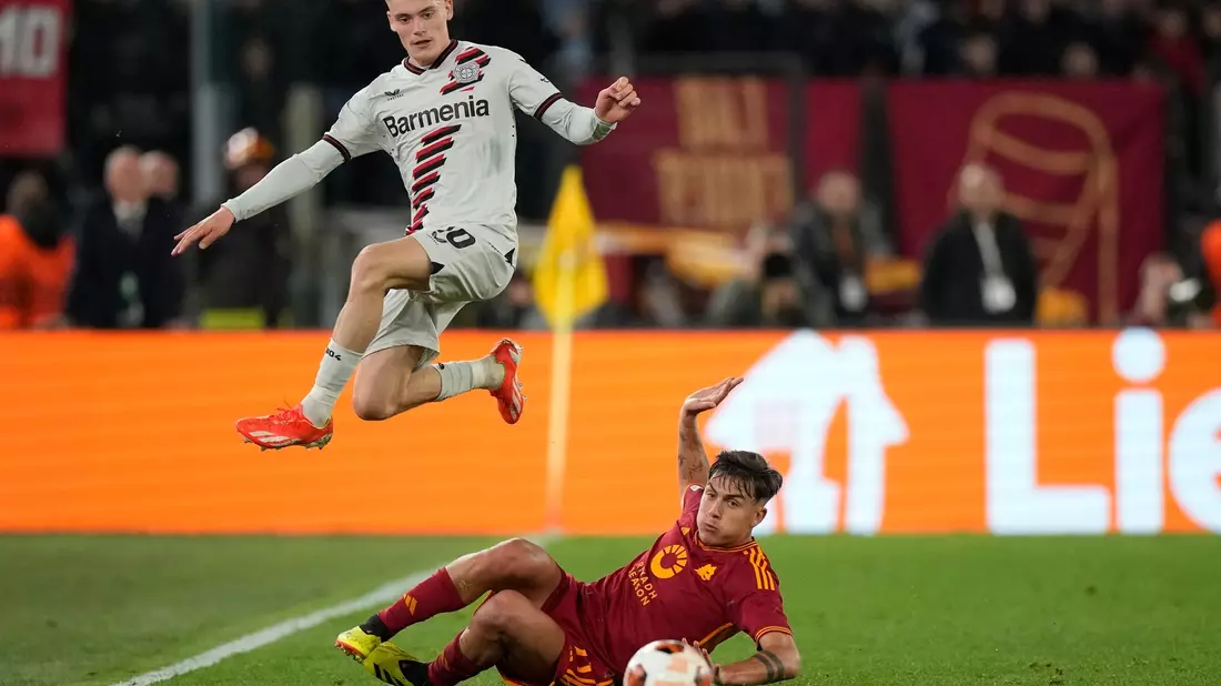 Florian Wirtz (l) und Co. gewannen das Hinspiel in Rom 2:0. - Bild: Andrew Medichini/AP/dpa