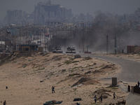 Beim Ansturm auf ein UN-Lagerhaus kommt es zu Todesfällen.  - Foto: Abdel Kareem Hana/AP/dpa
