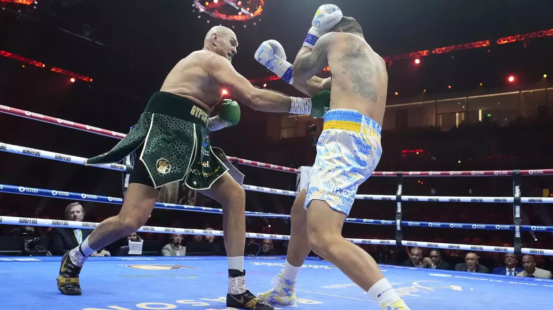 Tyson Fury (l) kämpfte gegen Oleksandr Usyk um mehrere Weltmeistertitel im Schwergewicht. - Bild: Nick Potts/PA Wire/dpa