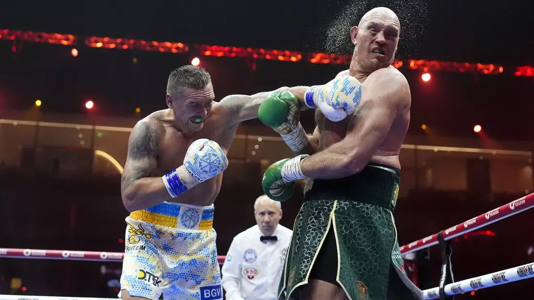 Der Ukrainer Oleksandr Usyk (l) hatte Tyson Fury am Ende der neunten Runde am Rande des Kockouts. - Bild: Nick Potts/PA Wire/dpa