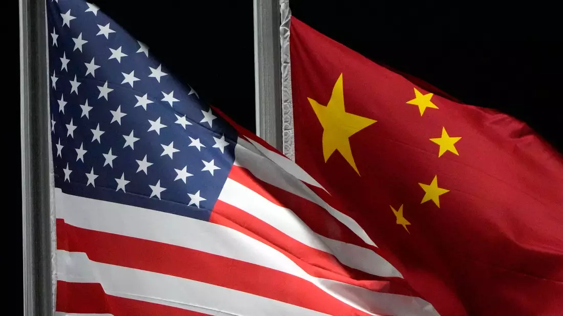 China hat Sanktionen gegen drei US-Rüstungskonzerne angekündigt. - Bild: Kiichiro Sato/AP/dpa