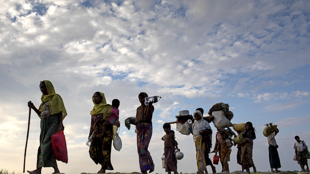 Drangsaliert und teilweise zwangsrekrutiert: Flüchtende Rohingya aus Myanmar. - Foto: Km Asad/ZUMA/dpa