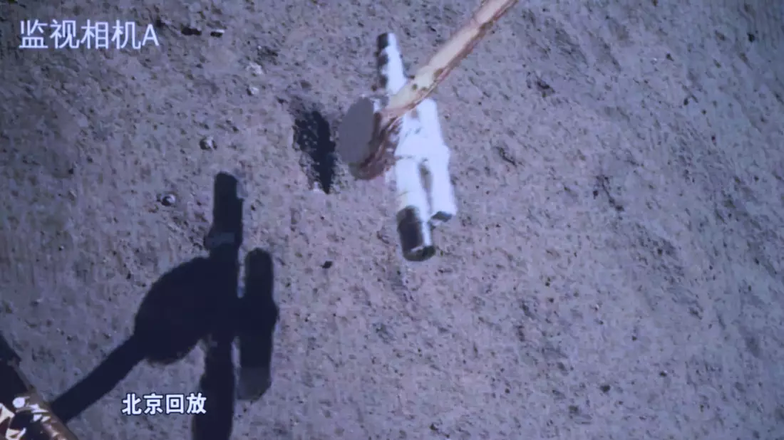 Die Chang'e-6-Sonde sammelt Proben auf dem Mond. - Bild: Jin Liwang/XinHua/dpa