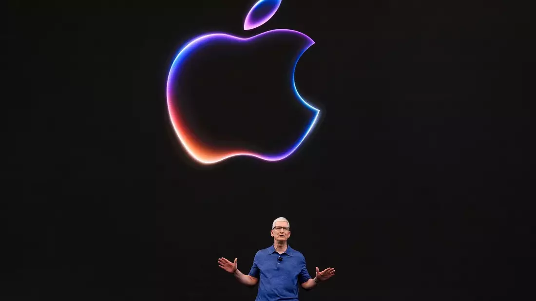 Apple-CEO Tim Cook auf der Apple-Entwicklerkonferenz WWDC in Cupertino. - Bild: Jeff Chiu/AP/dpa