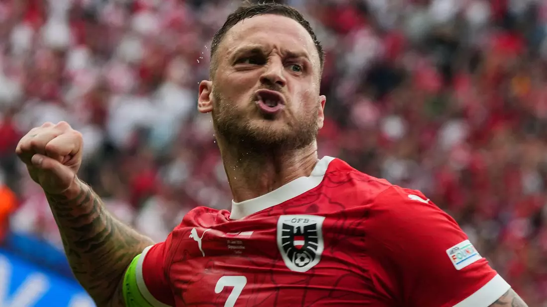Österreichs Marko Arnautovic feiert sein Tor zum 3:1. - Bild: Sören Stache/dpa