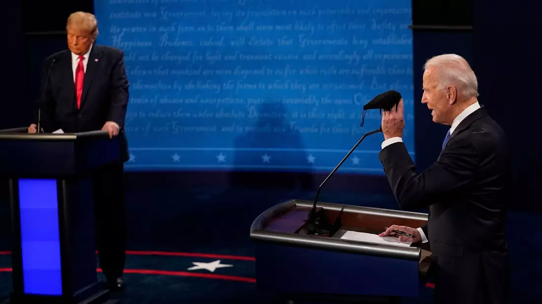 Donald Trump (l) und Joe Biden treffen im TV-Duell aufeinander. - Bild: Morry Gash/AP Pool/dpa