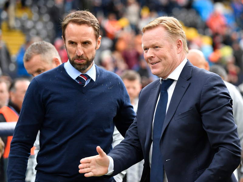 Treffen im EM-Halbfinale aufeinander: Englands Trainer Gareth Southgate (l) und Oranje-Coach Ronald Koeman. - Foto: Martin Meissner/AP/dpa