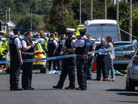 Bei einer Mahnwache gedachten zahlreiche Menschen friedlich der Opfer.
 - Foto: James Speakman/PA Wire/dpa