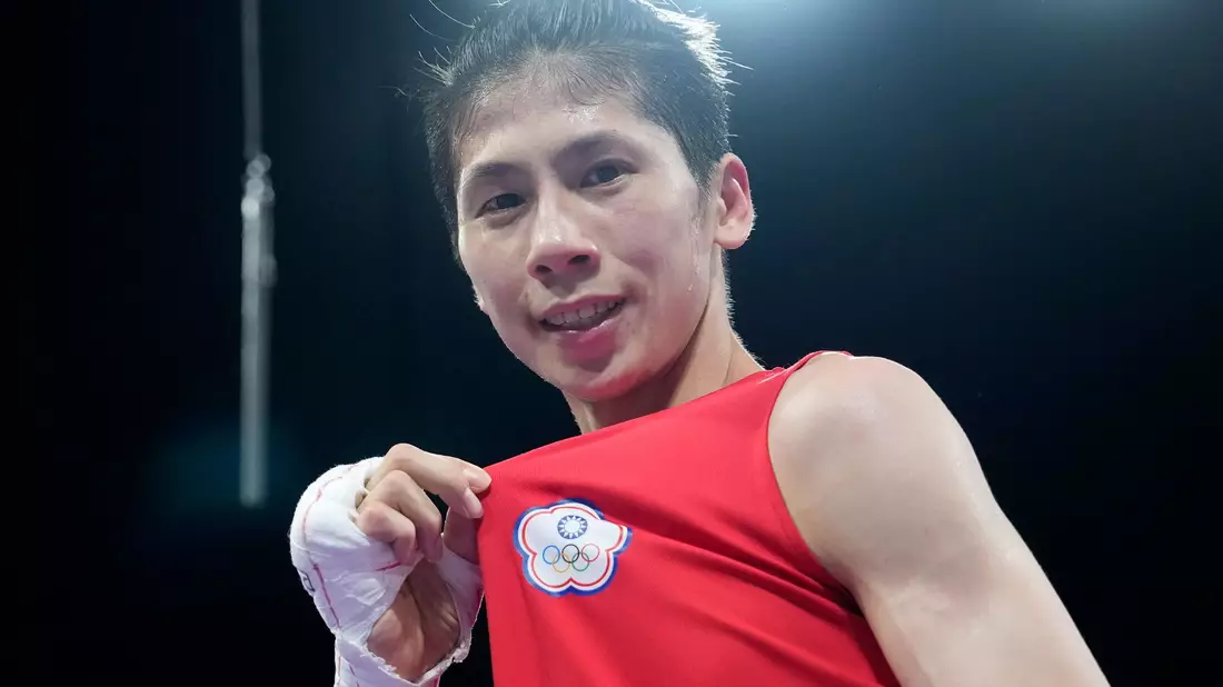 Lin Yu-Ting freut sich über eine Olympia-Medaille. - Bild: John Locher/AP/dpa