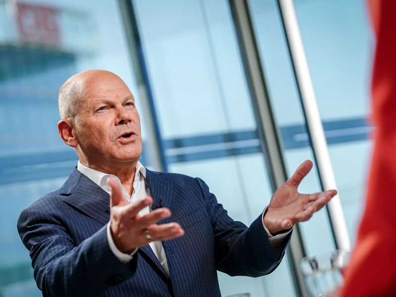 Harris oder Trump - mit einem von beiden muss Kanzler Scholz auf internationalem Parkett künftig zusammenarbeiten.  - Foto: Kay Nietfeld/dpa