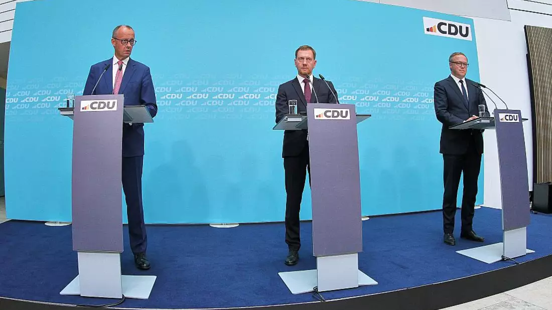Friedrich Merz, Michael Kretschmer, Mario Voigt am 02.09.2024 - Bild: über dts Nachrichtenagentur
