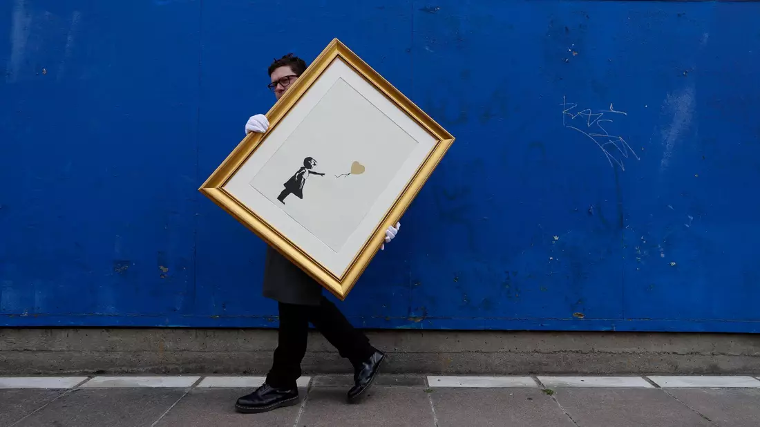 «Girl With Balloon» ist eines der bekanntesten Werke des Künstlers. (Archivbild) - Bild: Kirsty Wigglesworth/AP/dpa