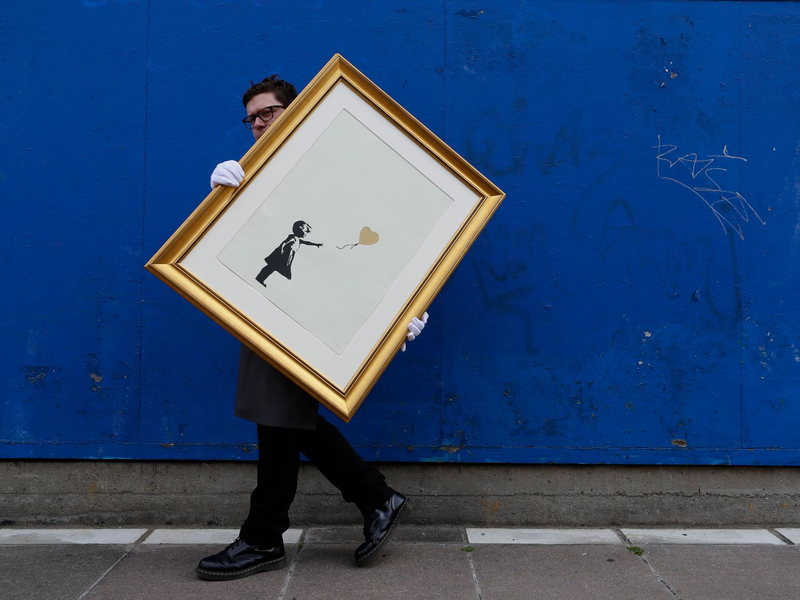 «Girl With Balloon» ist eines der bekanntesten Werke des Künstlers. (Archivbild) - Foto: Kirsty Wigglesworth/AP/dpa
