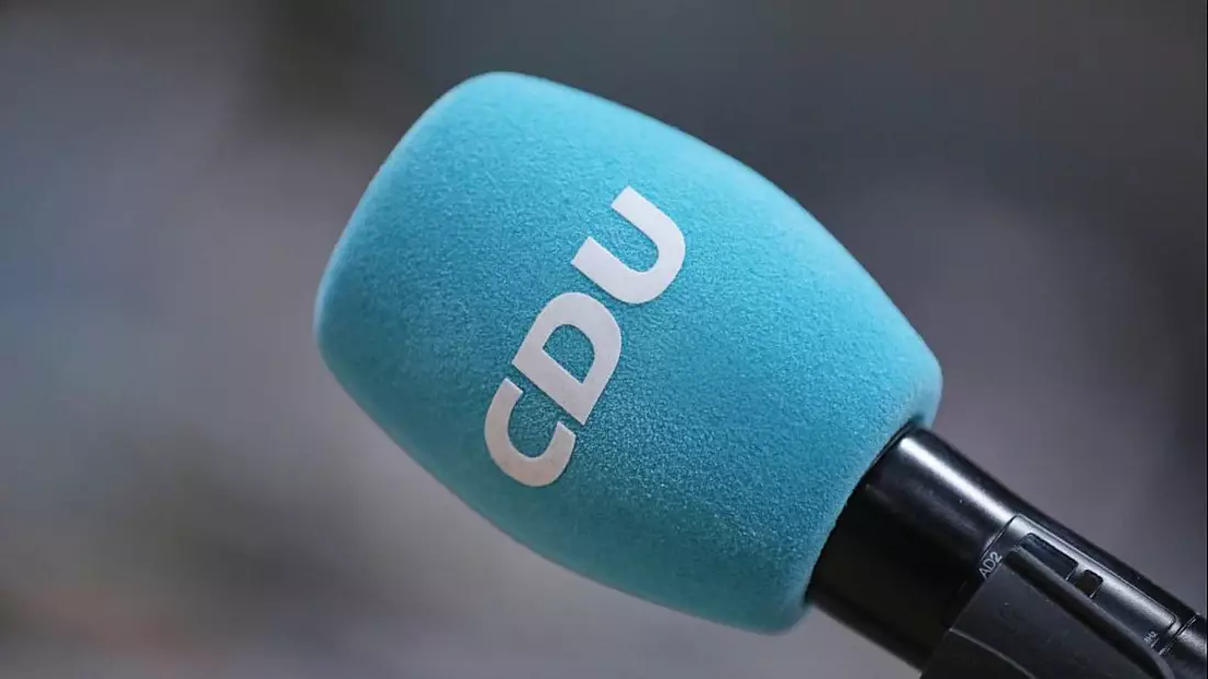 CDU-Logo auf Mikrophon (Archiv) - Bild: über dts Nachrichtenagentur