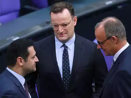 Djir-Sarai, Spahn, Merz (Archiv) - Foto: über dts Nachrichtenagentur