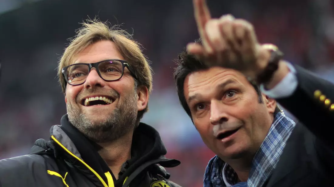 Christian Heidel (r) versteht jürgen Klopps Entscheidung. - Bild: Fredrik Von Erichsen/dpa