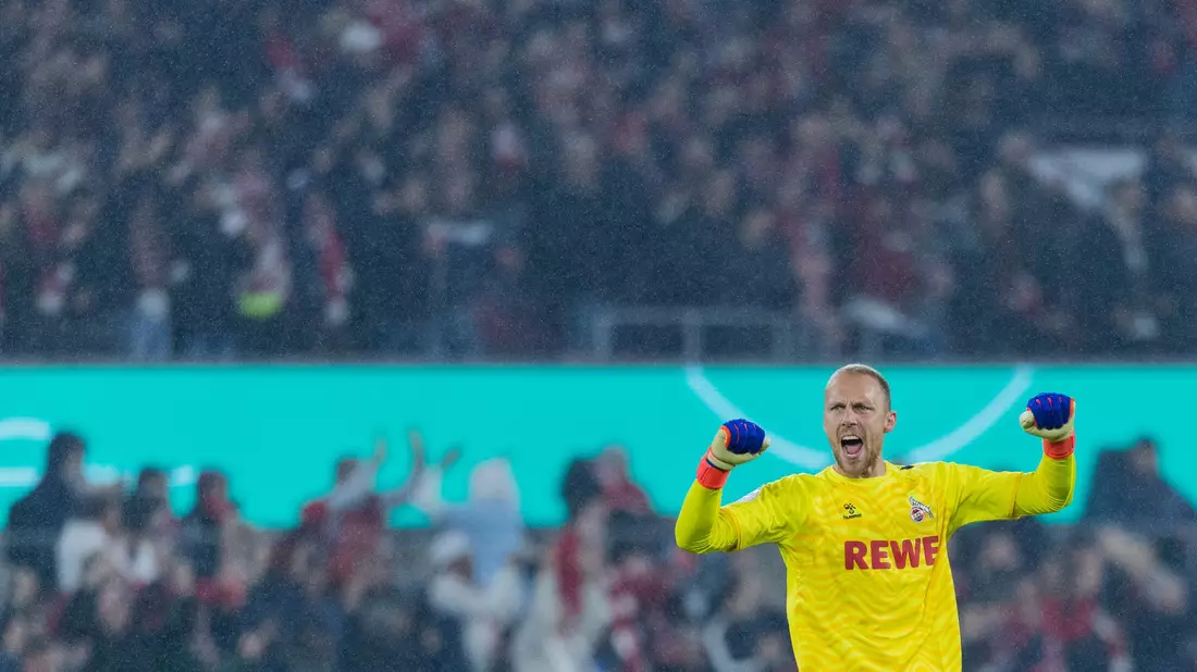 Kölns Lemperle köpft das 1:0 gegen Kiel - Bild: Rolf Vennenbernd/dpa