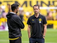 BVB-Boss Lars Ricken diskutiert nicht über Trainer Nuri Sahin (links) - Foto: David Inderlied/dpa