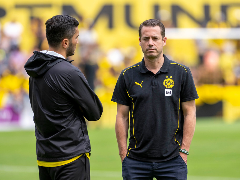 BVB-Boss Lars Ricken diskutiert nicht über Trainer Nuri Sahin (links) - Foto: David Inderlied/dpa