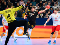 Jannik Kohlbacher (2.v.r.) und Sebastian Heymann fallen für die Handball-WM aus. - Foto: Marco Wolf/dpa