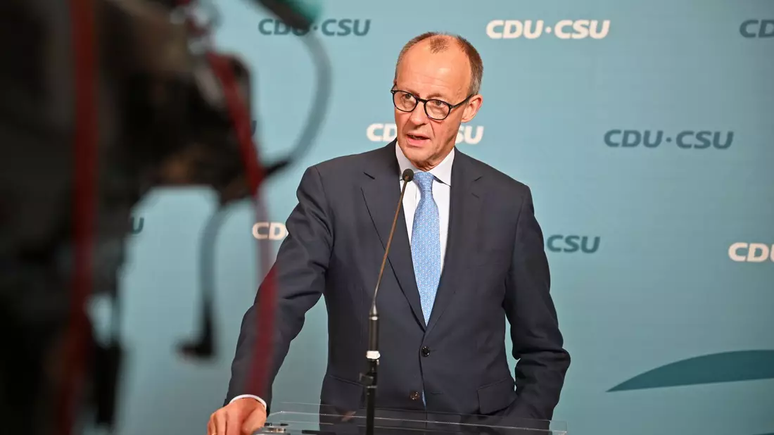 CDU-Chef Friedrich Merz zeigt sich am Ende zufrieden mit dem Wahltermin - Bild: Anna Ross/dpa