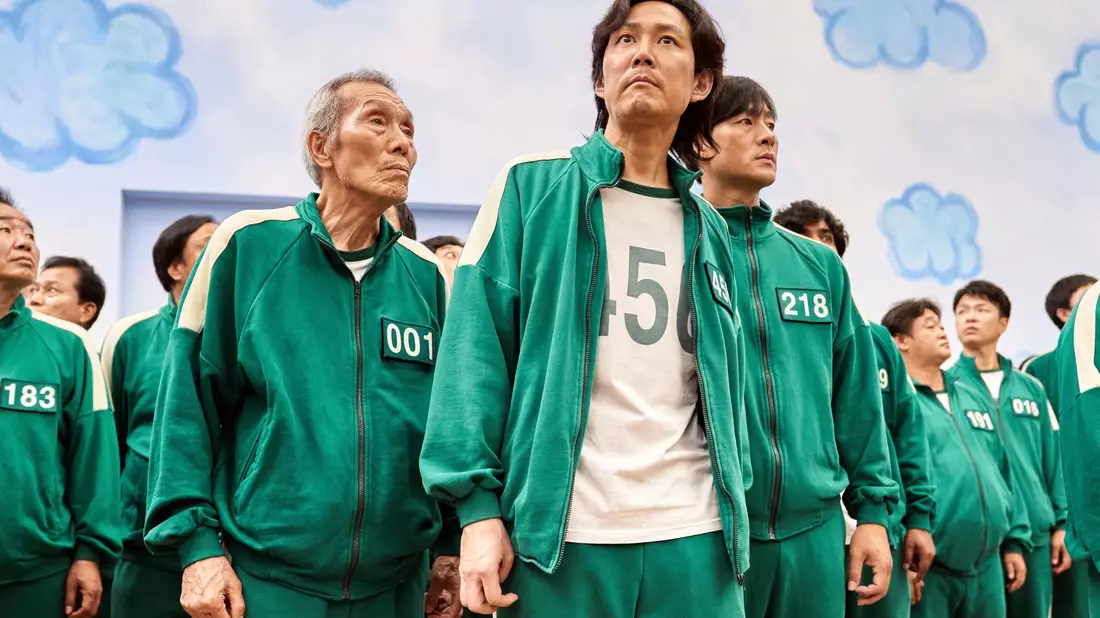 Lee Jung-Jae (M) erinnert an die Idee hinter Squid Game. - Bild: Noh Juhan/Netflix via AP/dpa