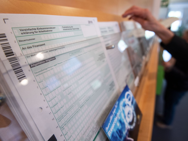 SPD, Grüne und FDP wollen Entlastungen für die Bürger beschließen. (Archivfoto) - Foto: Marijan Murat/dpa