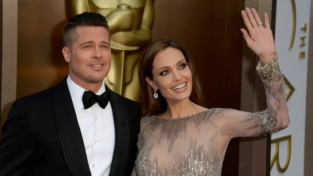 Nach mehr als acht Jahren sind die Papiere nun endlich unterzeichnet: Brad Pitt und Angelina Jolie gehen offiziell als geschieden ins neue Jahr. (Archivbild) - Bild: Mike Nelson/EPA/dpa