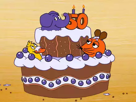 Der kleine Elefant, die Maus und die Ente sitzen auf einer Torte - am 5. Januar 2025 hat der Elefant seinen 50. Geburtstag. (Bild: WDR) - Foto: Friedrich Streich/Trickstudio Lutterbeck WDR/dpa
