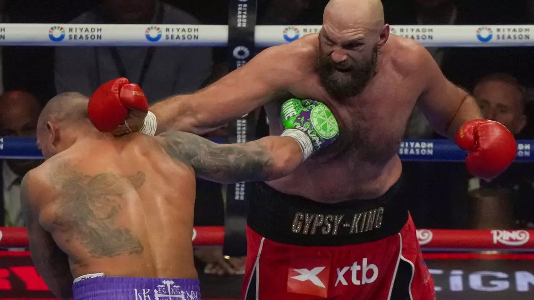 Tyson Fury (r) hat erneut seine Karriere beendet. - Bild: Frank Augstein/AP/dpa