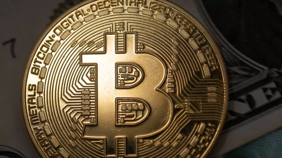 Der Bitcoin ist auf ein Rekordhoch gestiegen. - Bild: Fernando Gutierrez-Juarez/dpa