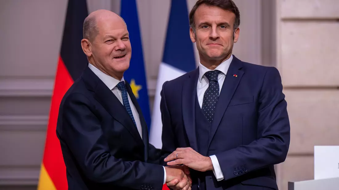 Kanzler Scholz und Präsident Macron beschwören Europas Einigkeit gegenüber Trump. - Bild: Michael Kappeler/dpa