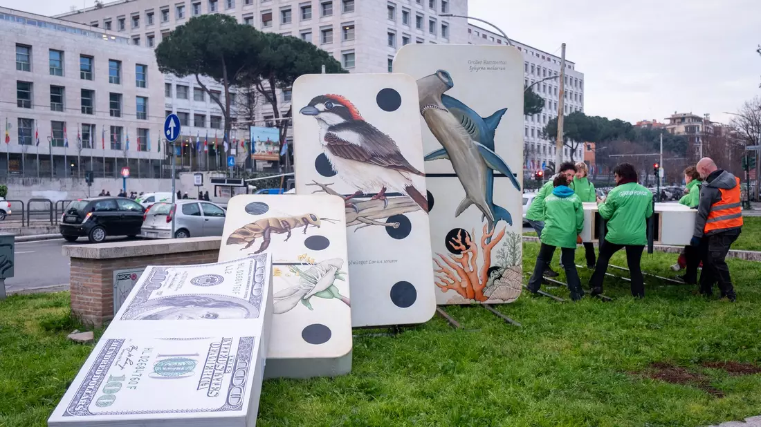 Umweltschützer begleiteten die UN-Konferenz zunächst mit Protesten - und waren am Ende zufrieden mit dem Ergebnis. - Bild: Marco Di Gianvito/ZUMA Press Wire/dpa