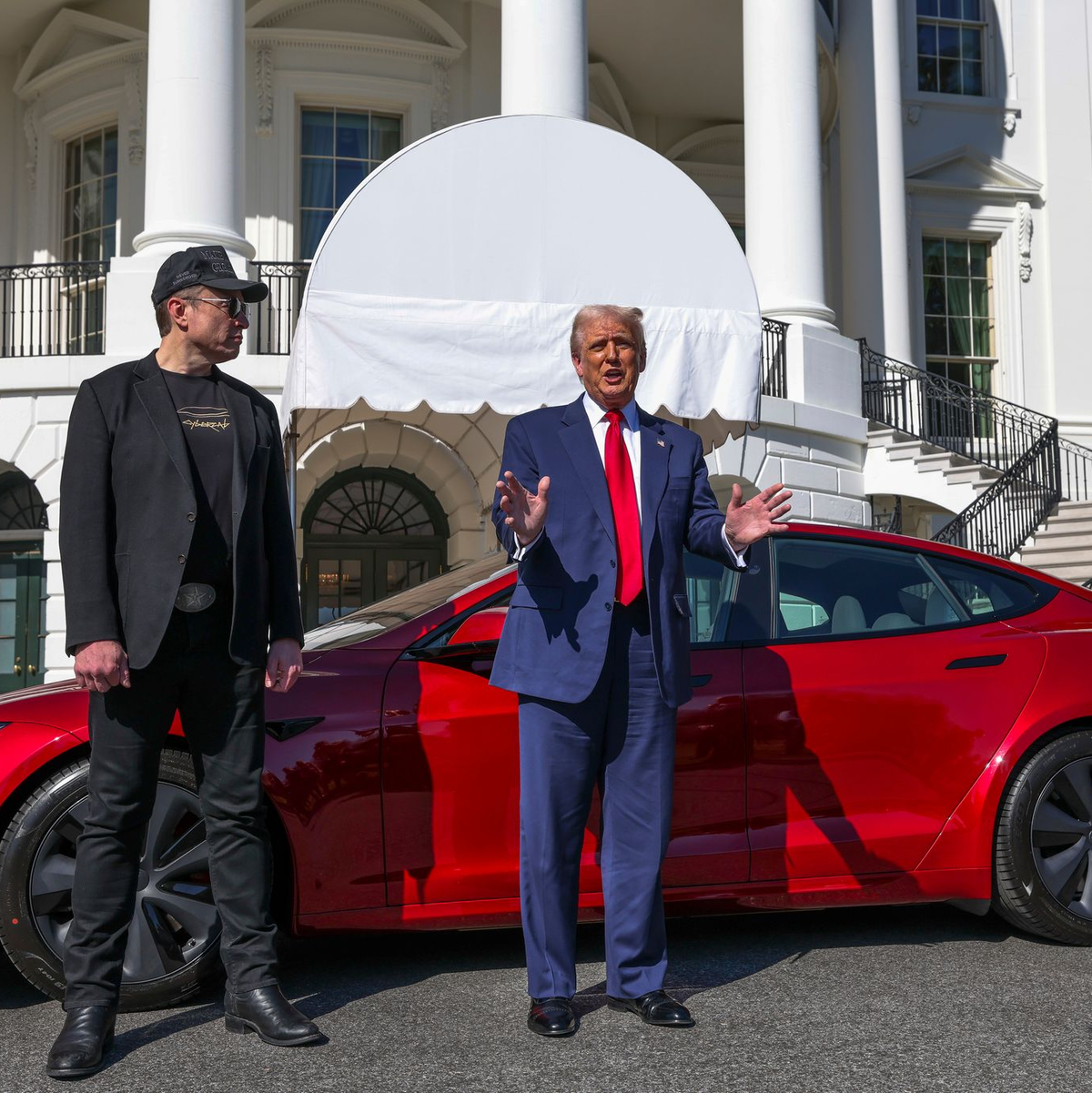 Trump machte sogar Werbung für den Tesla-Chef. - Foto: -/Pool/AP/dpa