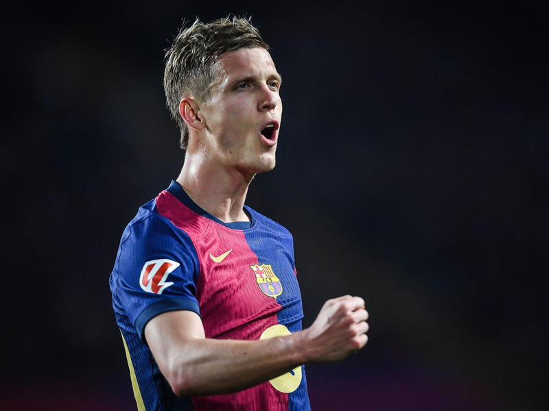 Barcelonas Dani Olmo verletzt sich im Spiel gegen Osasuna. - Foto: Matthieu Mirville/ZUMA Press Wire/dpa