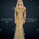 Versace - hier die Schwester von Firmengründer Gianni Versace, Donatella - gehört nun komplett zu Prada. (Archivbild) - Foto: Evan Agostini/Invision/AP/dpa