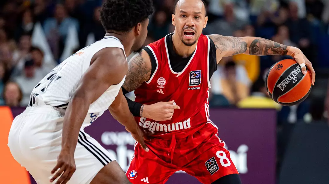 Shabazz Napier (r) war gegen Madrid bester Münchner Werfer. - Bild: Alberto Gardin/ZUMA Press Wire/dpa