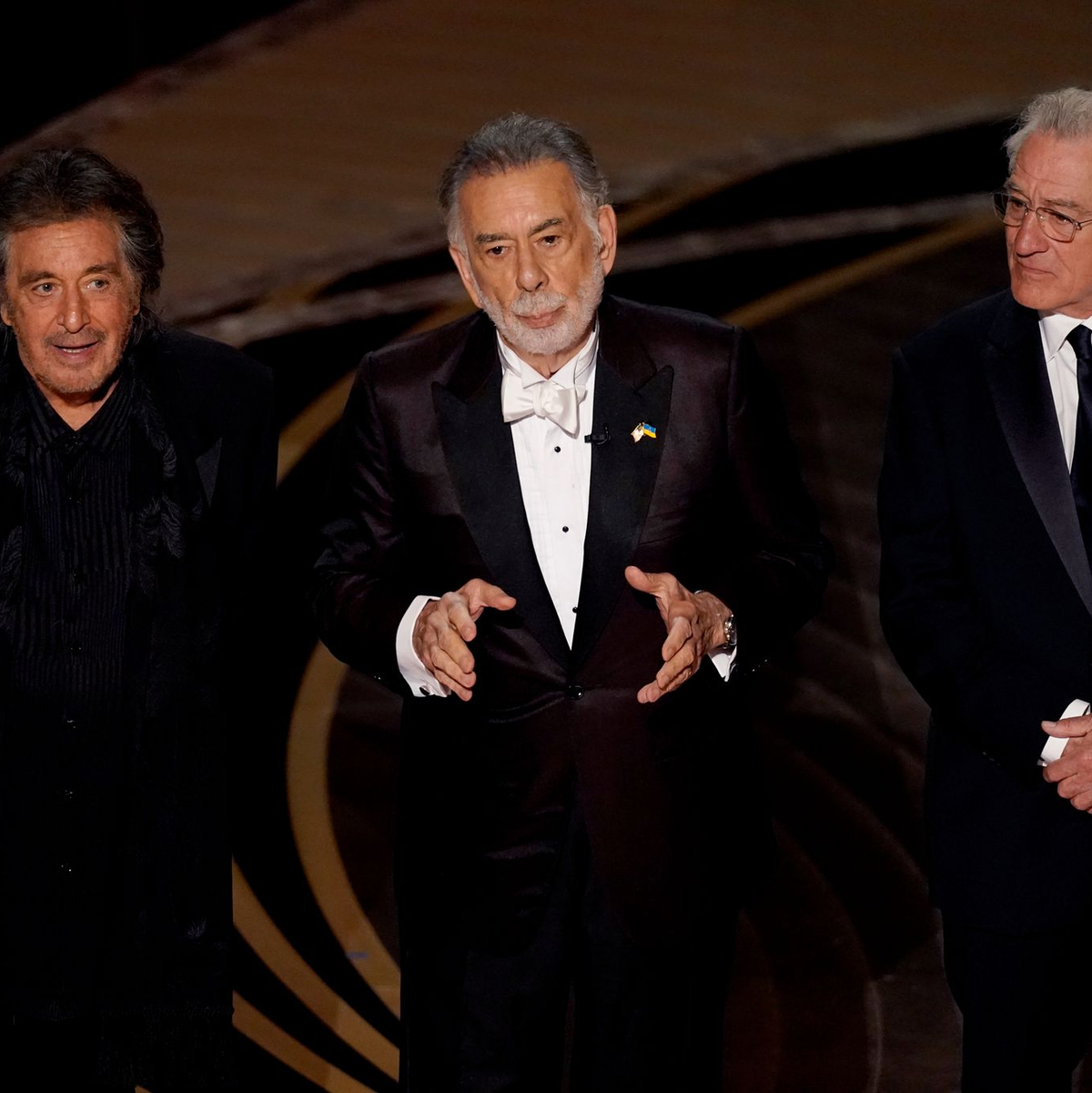 Al Pacino (l-r), Francis Ford Coppola und Robert De Niro stehen bei der 94. Verleihung der Academy Awards in Hollywood gemeinsam auf der Bühne. - Foto: Chris Pizzello/Invision/AP/dpa