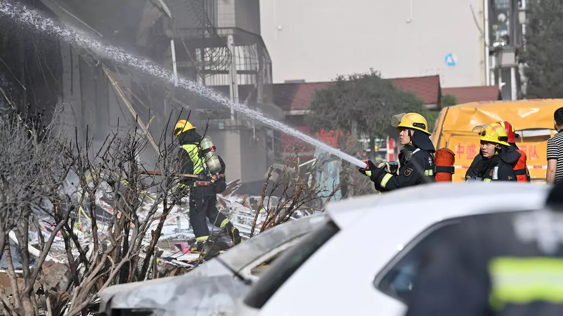 Zwei Menschen galten nach dem Brand in Taiyuan noch als Vermisst.  - Bild: Yang Chenguang/XinHua/dpa