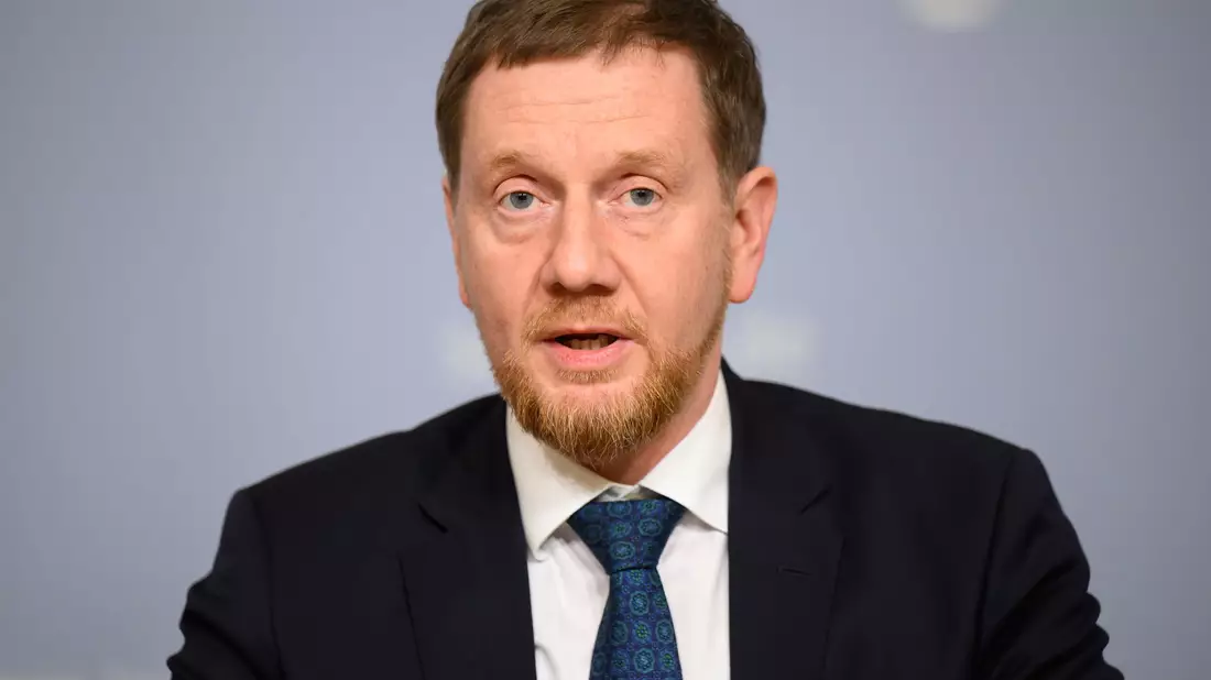 Die Länder seien sich einig in ihrer Forderung nach Ersatz ihrer Kosten, sagt der Vorsitzende der Ministerpräsidentenkonferenz, Michael Kretschmer. (Archivbild) - Bild: Robert Michael/dpa