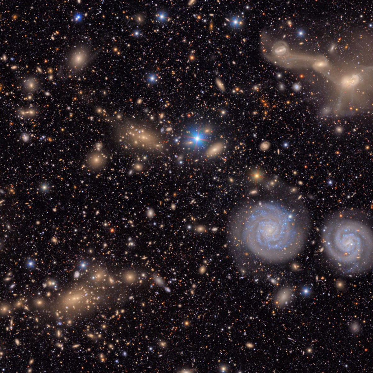  Im Virgo-Cluster außerhalb der Milchstraße sind zwei Spiralgalaxien (rechts unten) deutlich zu sehen. - Foto: ---/NSF-DOE Vera C. Rubin Observatory/dpa