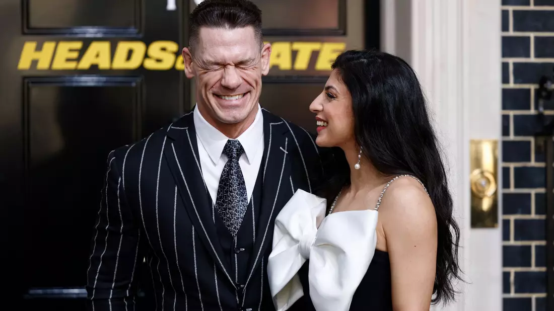 In dem Film «Heads Of State» spielt John Cena (hier mit seiner Frau Shay Shariatzadeh bei der Filmpremiere) den US-Präsidenten Will Derringer, der wider Willen zum Actionhelden wird. - Bild: Millie Turner/Invision/AP/dpa