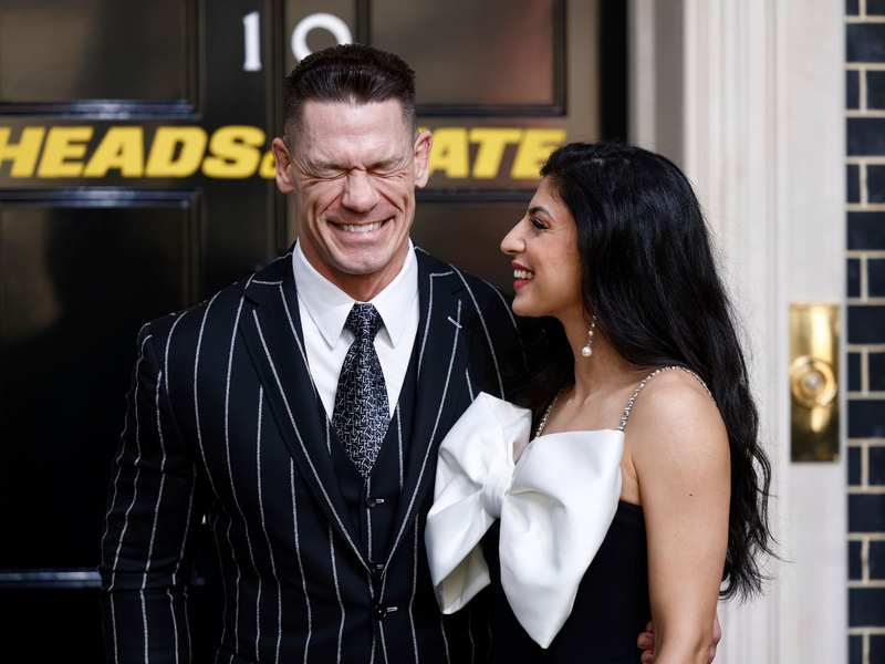 In dem Film «Heads Of State» spielt John Cena (hier mit seiner Frau Shay Shariatzadeh bei der Filmpremiere) den US-Präsidenten Will Derringer, der wider Willen zum Actionhelden wird. - Foto: Millie Turner/Invision/AP/dpa
