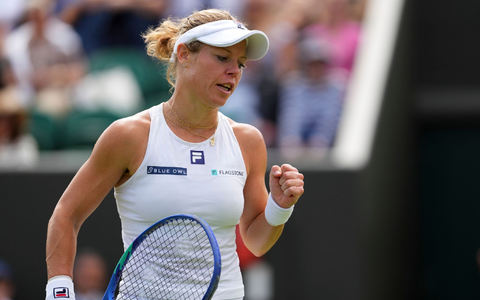 Laura Siegemund umarmt ihren Freund und Trainer Antonio Zucca. - Foto: Kirsty Wigglesworth/AP/dpa