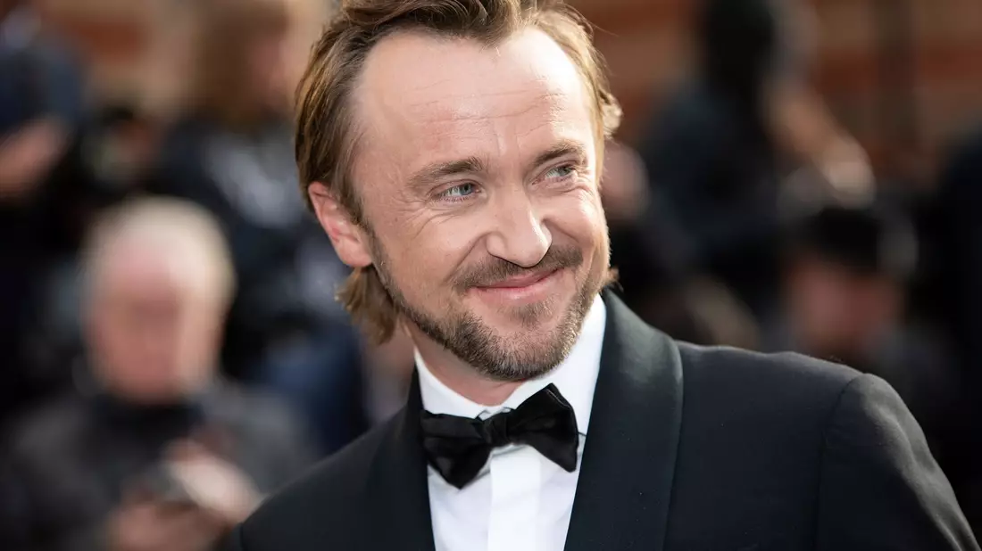 Berühmt wurde er als der blonde Erzrivale Draco Malfoy: Tom Felton kehrt ins Harry-Potter-Universum zurück. (Archivbild) - Bild: Vianney Le Caer/Invision via AP/dpa