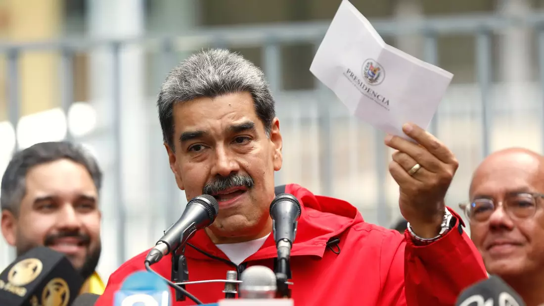 Die USA bieten 50 Millionen Dollar für Infos für eine Festnahme Maduros.  - Bild: Cristian Hernandez/AP/dpa