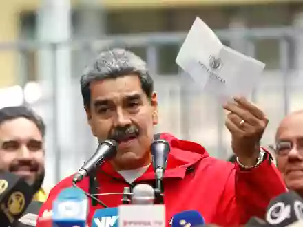 Die USA bieten 50 Millionen Dollar für Infos für eine Festnahme Maduros.  - Foto: Cristian Hernandez/AP/dpa
